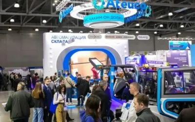 Visitors gathered around an exhibit at a trade expo