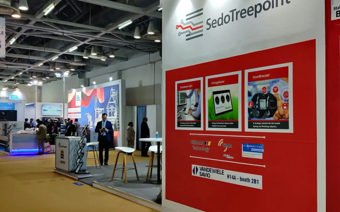 Red and white trade show booth with graphics